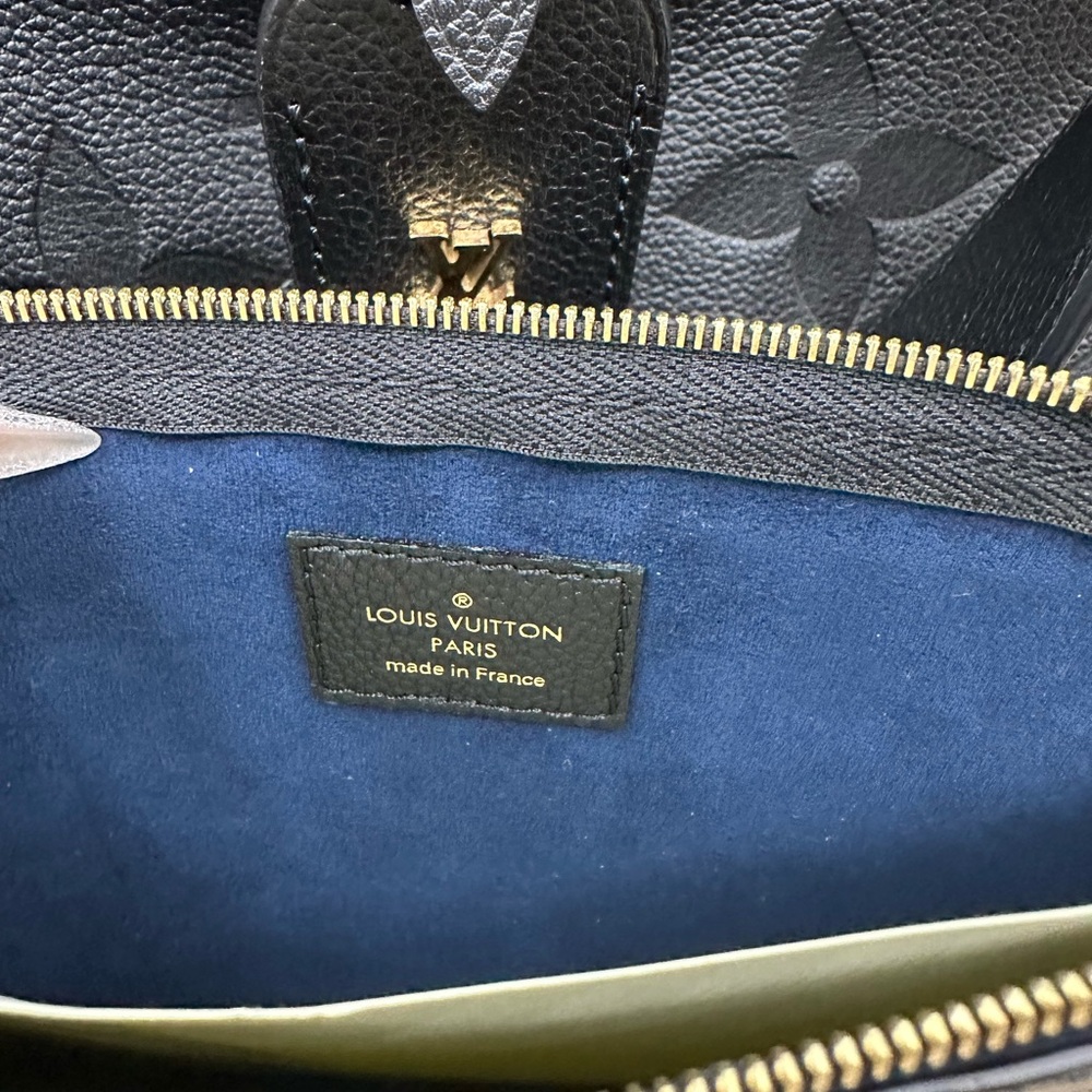 Louis Vuitton carry MM empriente - Picture 8 of 9